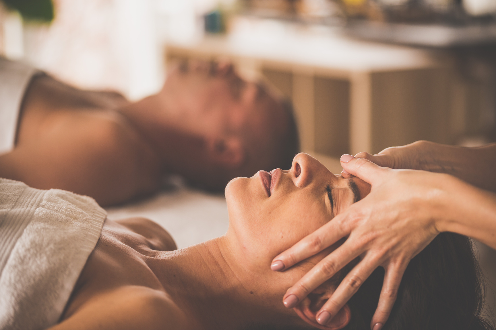 Couple relaxing at spa